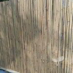 Hek bekleden met bamboemat